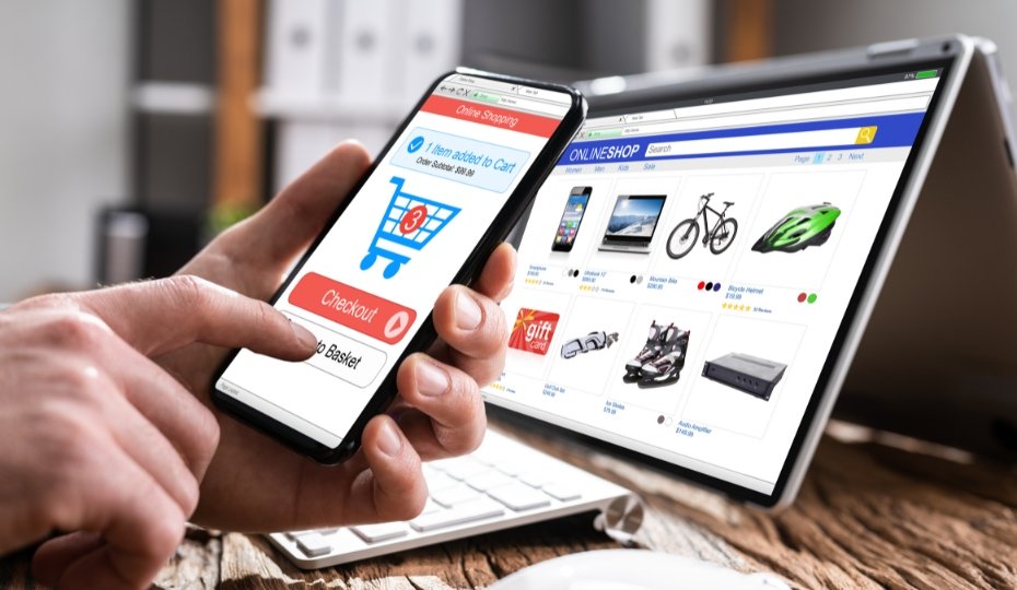 Increase Your Small Business Online Sales With These Ten Proven Ways 5 a person holding a phone and a laptop